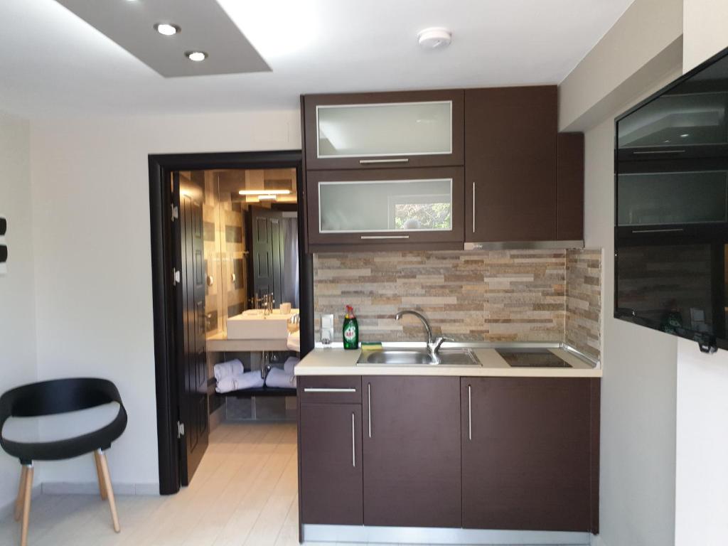 Kuchyň nebo kuchyňský kout v ubytování luxrooms