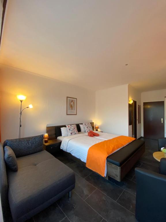 Säng eller sängar i ett rum på Sonnenstrand Hotel
