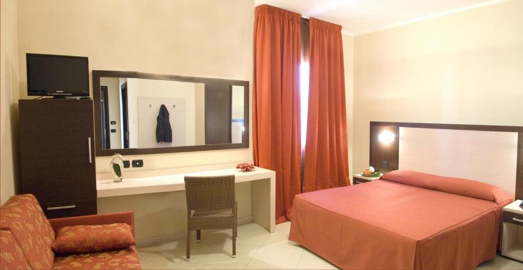 TV a/nebo společenská místnost v ubytování Hotel Risberg
