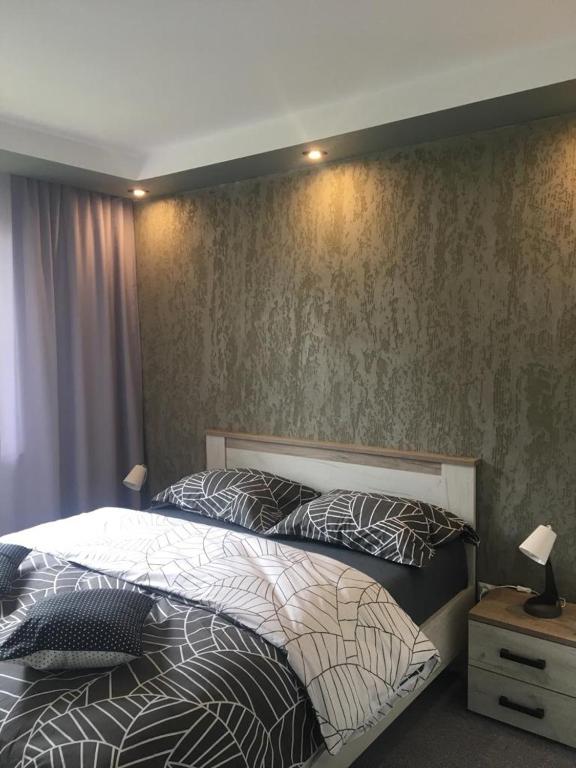 Posteľ alebo postele v izbe v ubytovaní Apartamenty Pod Jesionem