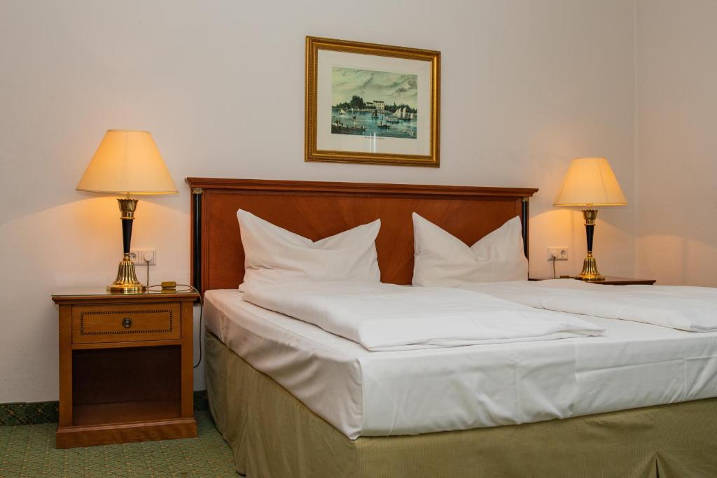 Postel nebo postele na pokoji v ubytování Alpenhotel Gastager