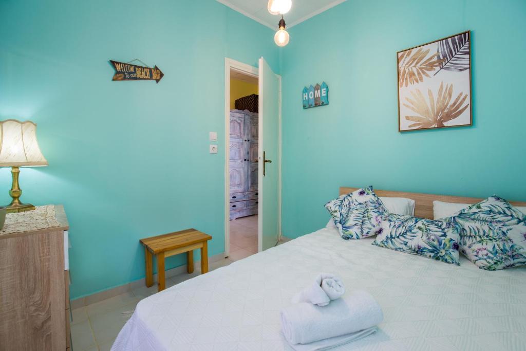 Postel nebo postele na pokoji v ubytování Olive Cottage