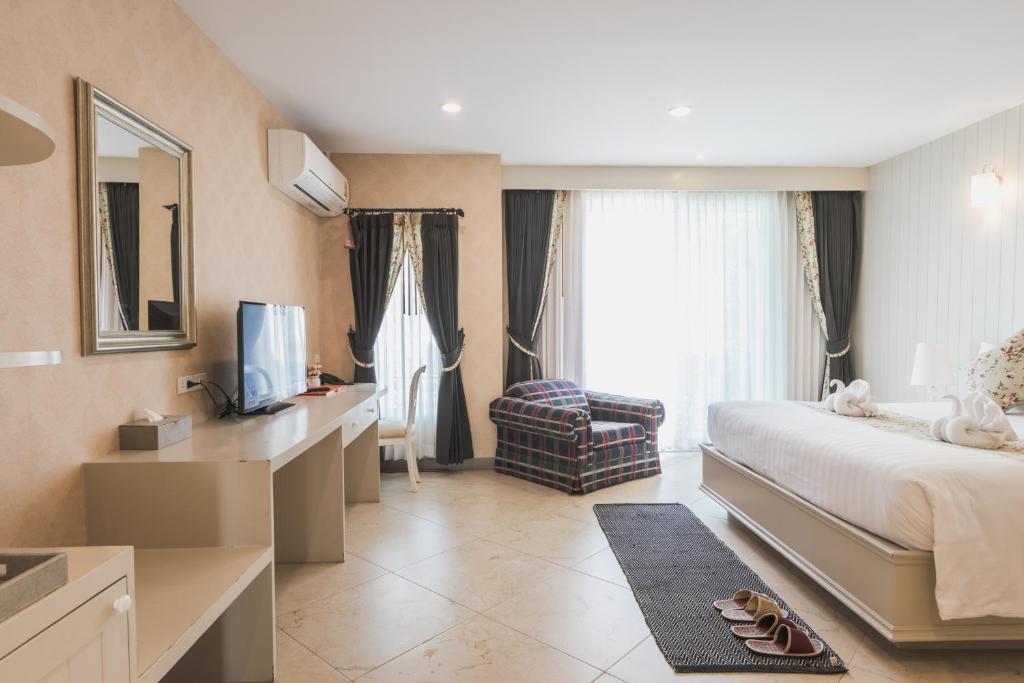 Postel nebo postele na pokoji v ubytování La Villa Boutique hotel