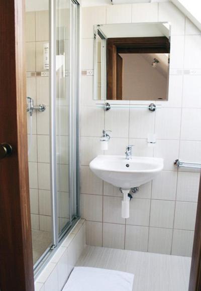Koupelna v ubytování Hotel Maxim