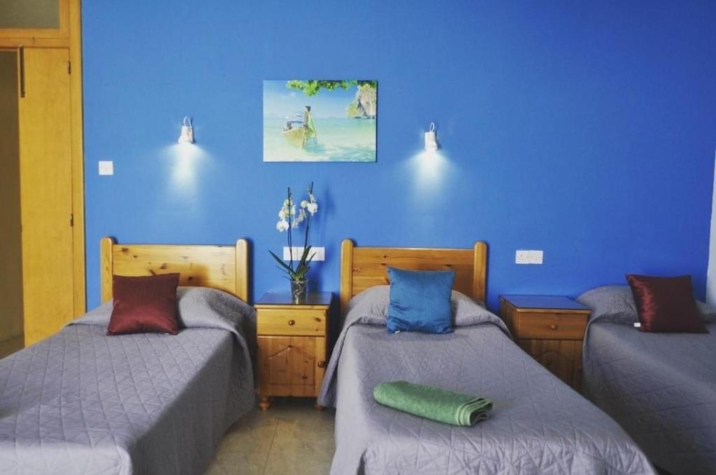 Postel nebo postele na pokoji v ubytování Gozo Belle Mare Apartments