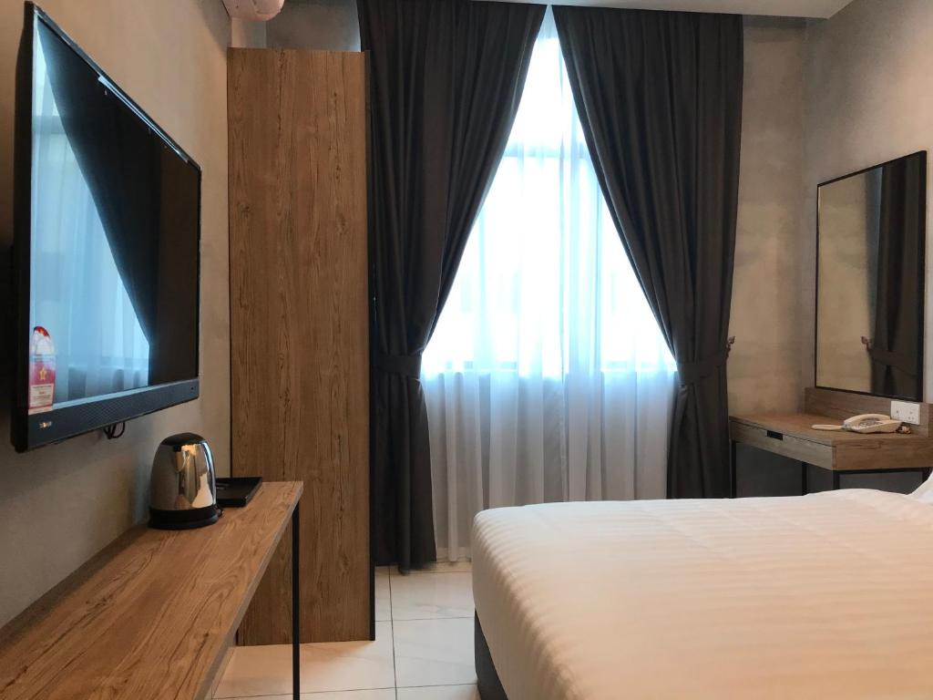Postel nebo postele na pokoji v ubytování Dandelion Inn