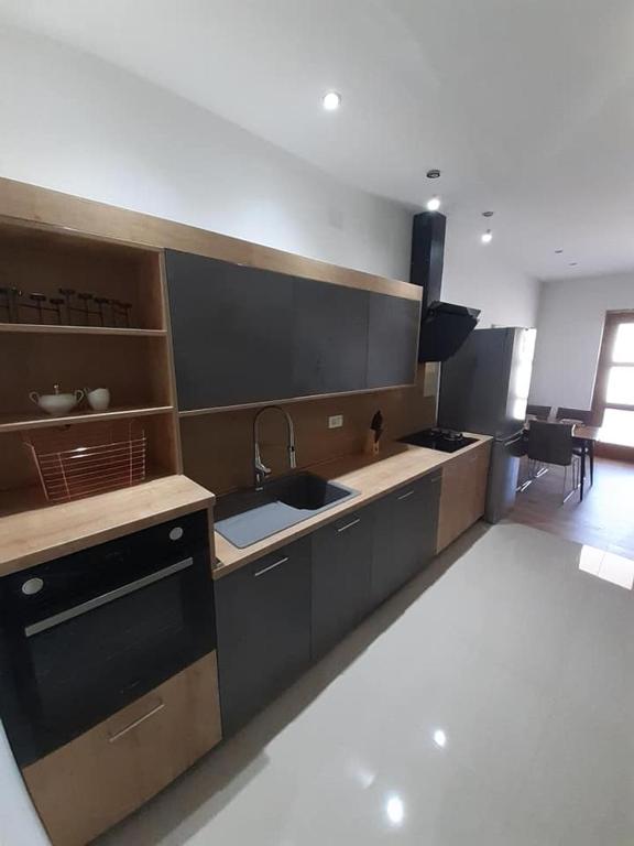 Kuchyň nebo kuchyňský kout v ubytování Villa Nina