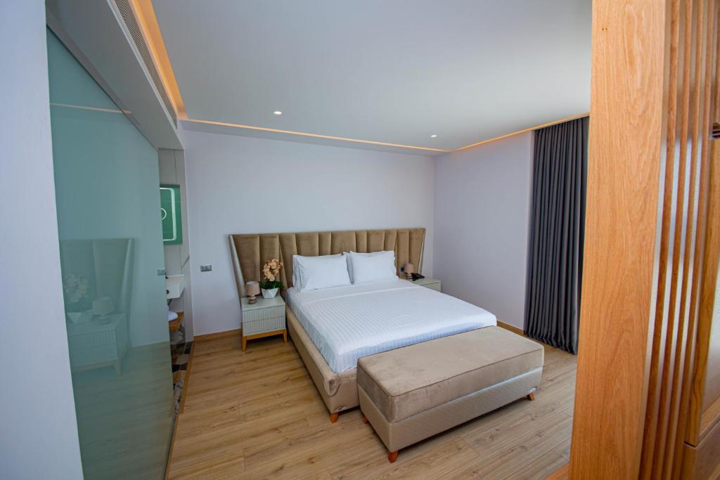 Postel nebo postele na pokoji v ubytování El Primero Hotel