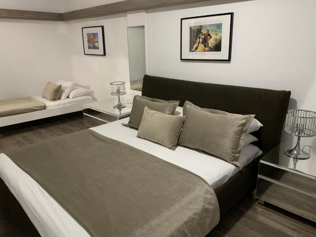 Postel nebo postele na pokoji v ubytování Pasithea Holiday Apartments