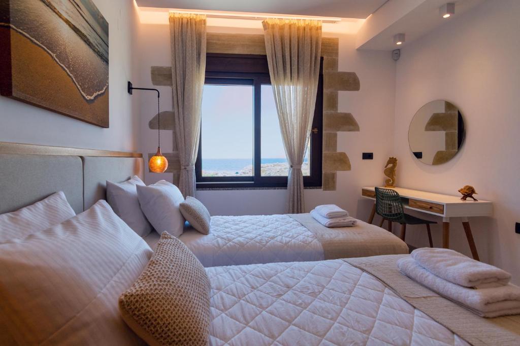 Posteľ alebo postele v izbe v ubytovaní Athinais villa