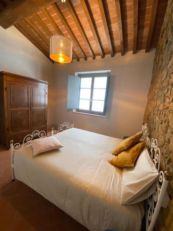 Postel nebo postele na pokoji v ubytování Il Cerro