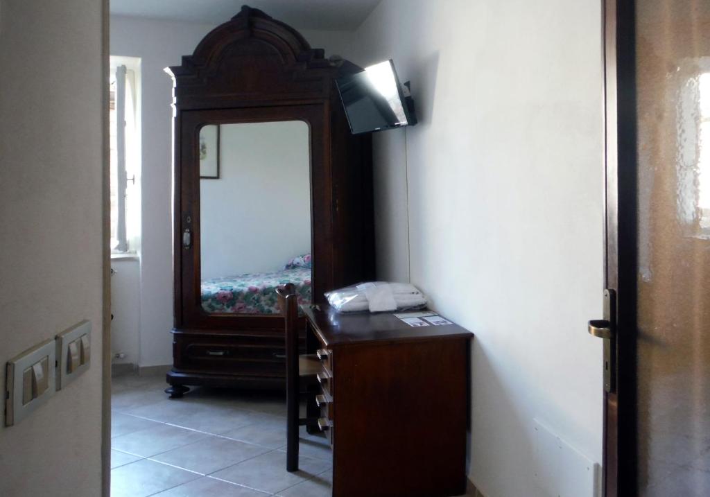 Posteľ alebo postele v izbe v ubytovaní Camere Gambacorta Assisi