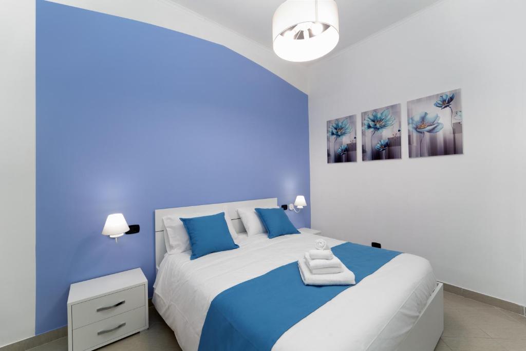 Posteľ alebo postele v izbe v ubytovaní Suite & Luxury Rooms Palazzo Diomede Carafa