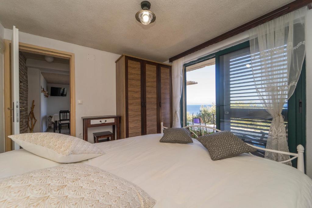 Ein Bett oder Betten in einem Zimmer der Unterkunft House on Punta