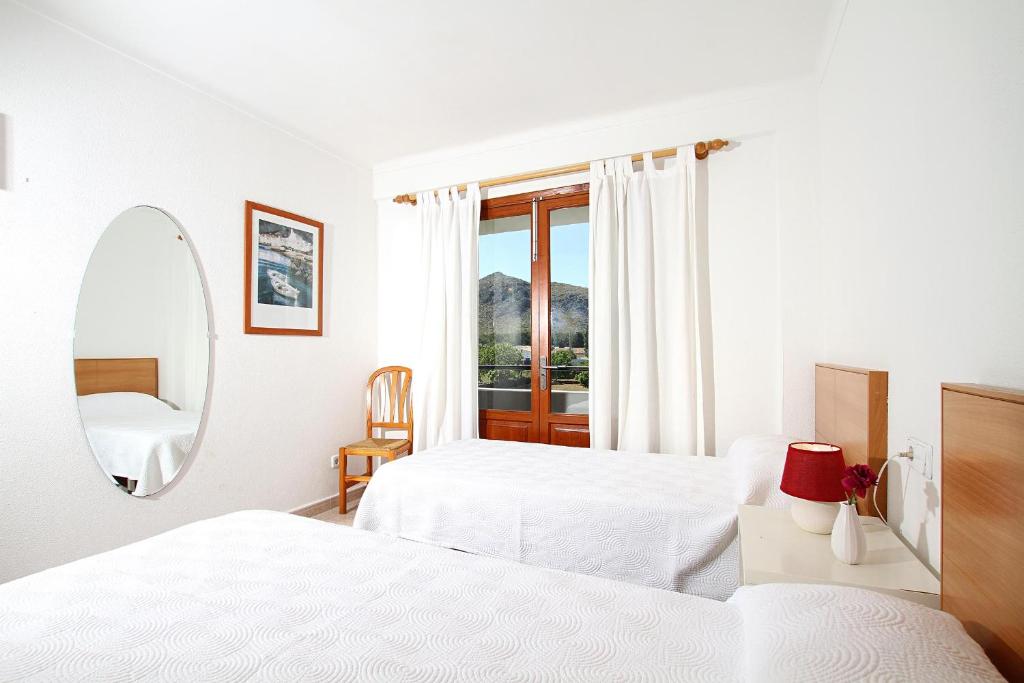 A bed or beds in a room at Villa Animeta