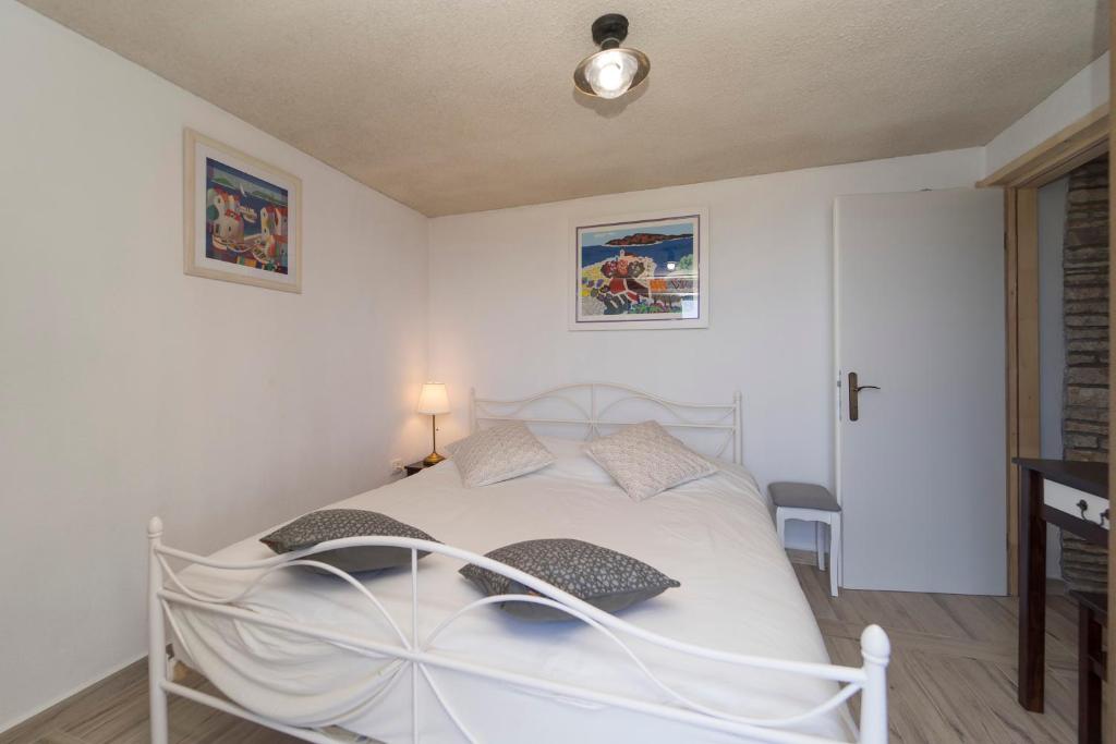 Postel nebo postele na pokoji v ubytování House on Punta