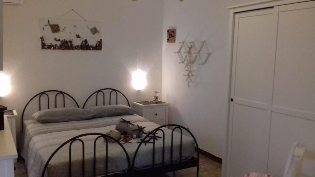 Letto o letti in una camera di Villetta dei Limoni