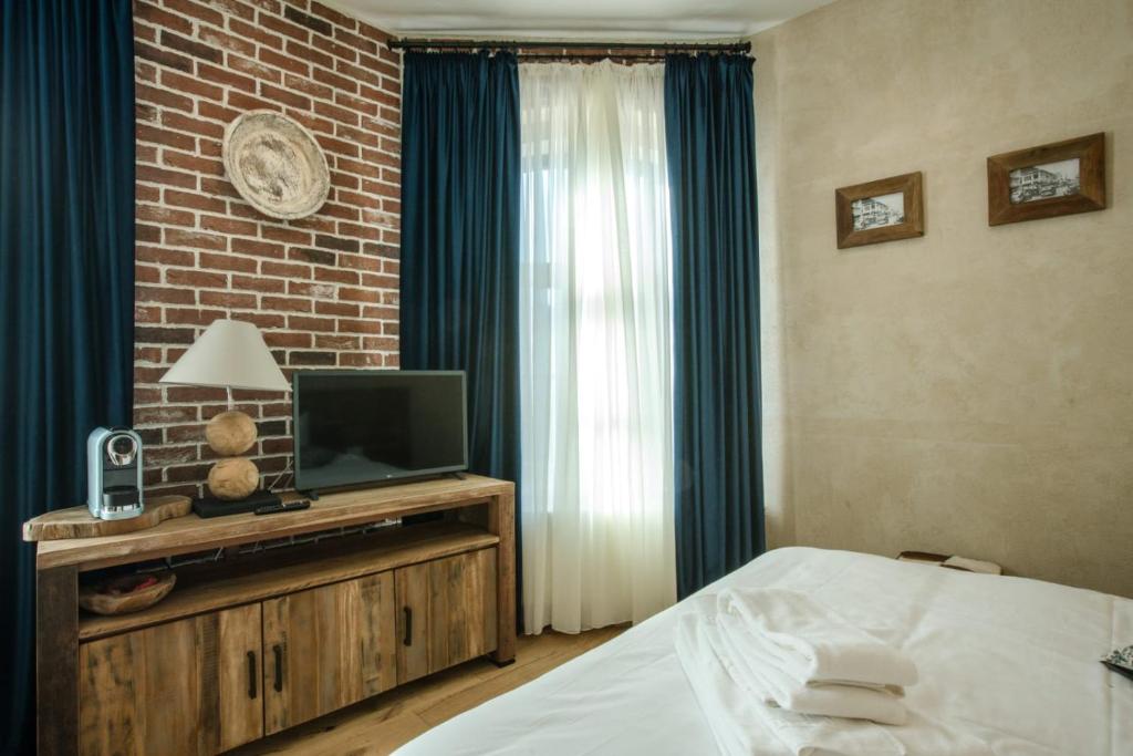 Postel nebo postele na pokoji v ubytování ACSA INN