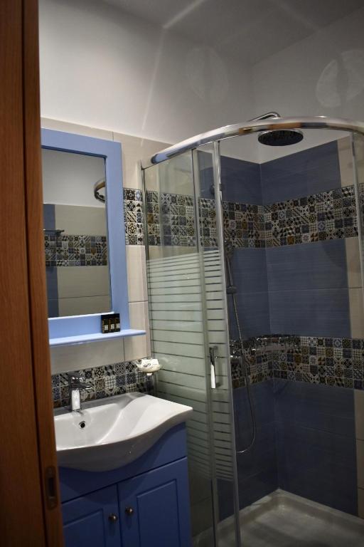 Koupelna v ubytování Minoa Hotel