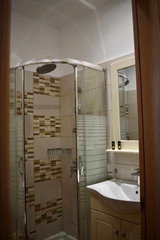 Koupelna v ubytování Minoa Hotel