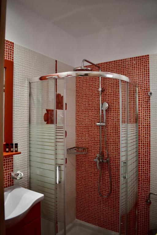 Koupelna v ubytování Minoa Hotel