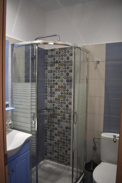 Koupelna v ubytování Minoa Hotel