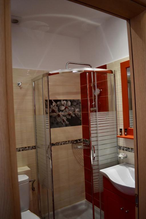 Koupelna v ubytování Minoa Hotel