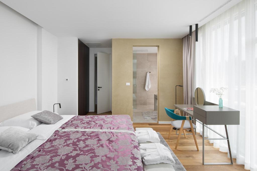 Posteľ alebo postele v izbe v ubytovaní Design Villa Noble with Spa