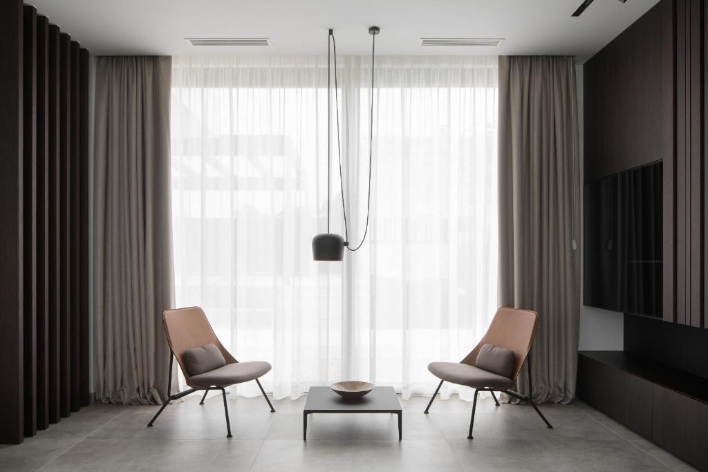 Posedenie v ubytovaní Design Villa Noble with Spa