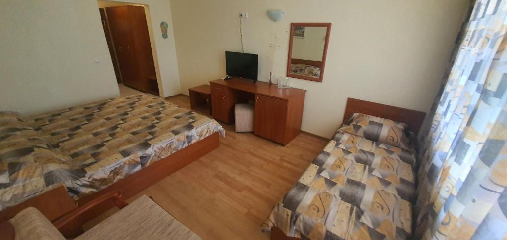 Postel nebo postele na pokoji v ubytování Diamond Hotel
