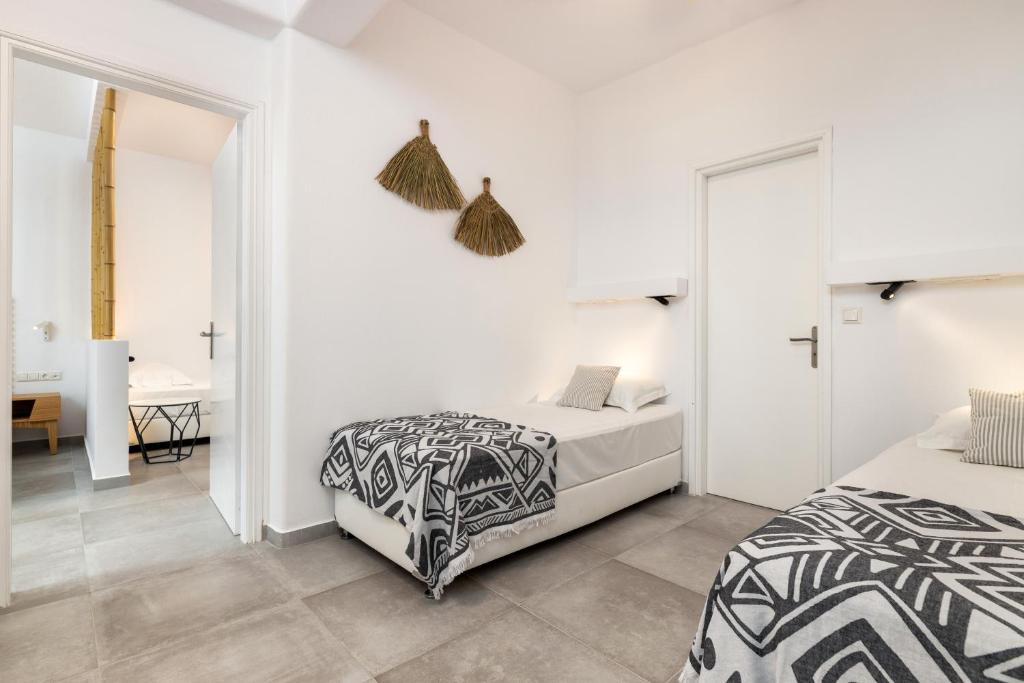 Posteľ alebo postele v izbe v ubytovaní Golden Beach Hotel