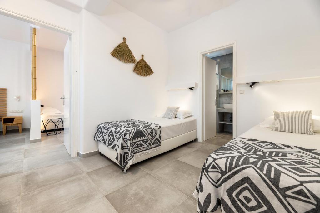 Posteľ alebo postele v izbe v ubytovaní Golden Beach Hotel