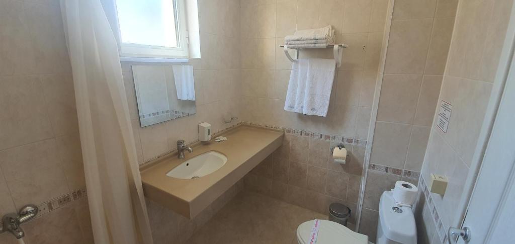 Koupelna v ubytování Diamond Hotel