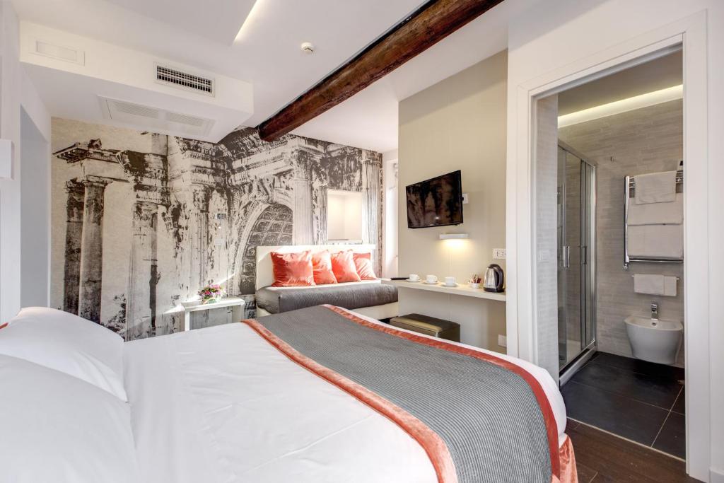 Postel nebo postele na pokoji v ubytování Albergo Abruzzi