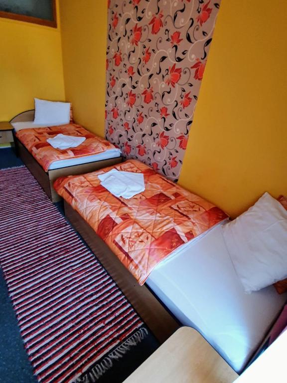Postel nebo postele na pokoji v ubytování Hotel Senica, Garni