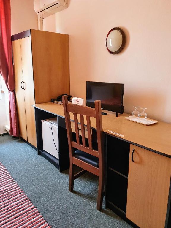 TV a/nebo společenská místnost v ubytování Hotel Senica, Garni