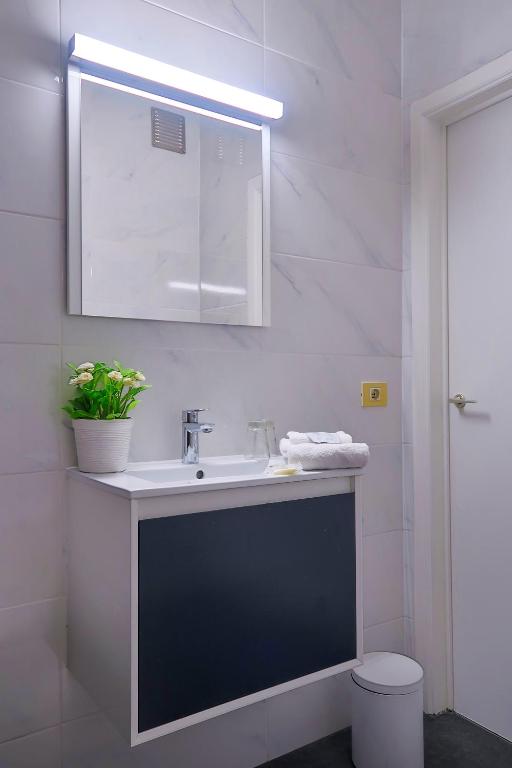 Koupelna v ubytování Hotel Adoma