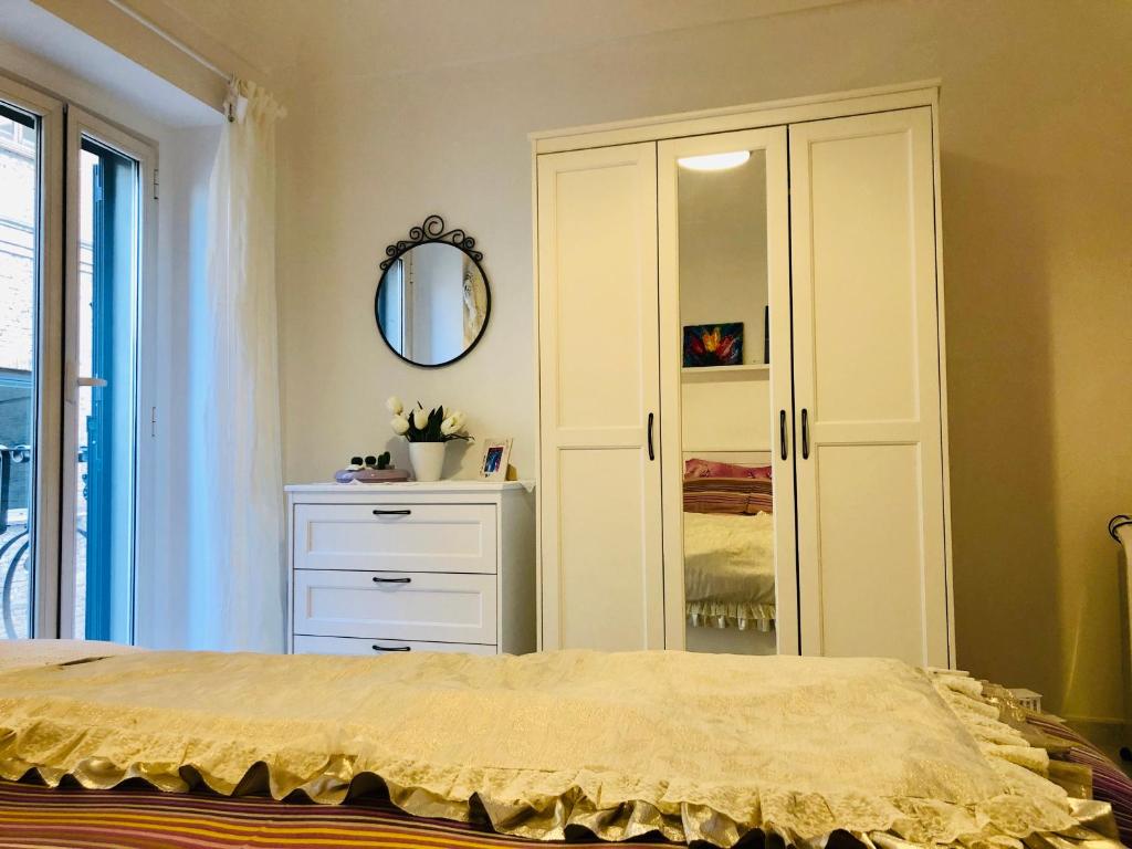 Łóżko lub łóżka w pokoju w obiekcie La casa di Nonna Clo, nel centro di Vasto
