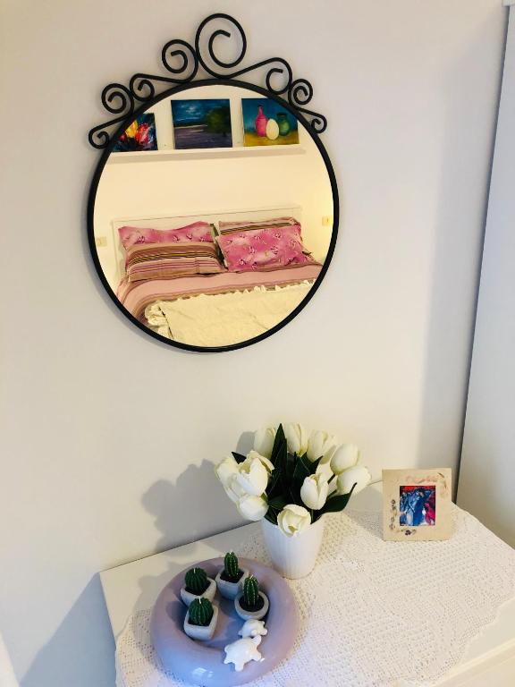 Łóżko lub łóżka w pokoju w obiekcie La casa di Nonna Clo, nel centro di Vasto