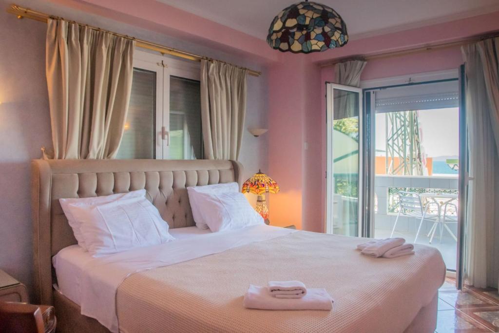 Postel nebo postele na pokoji v ubytování Hotel Astoria