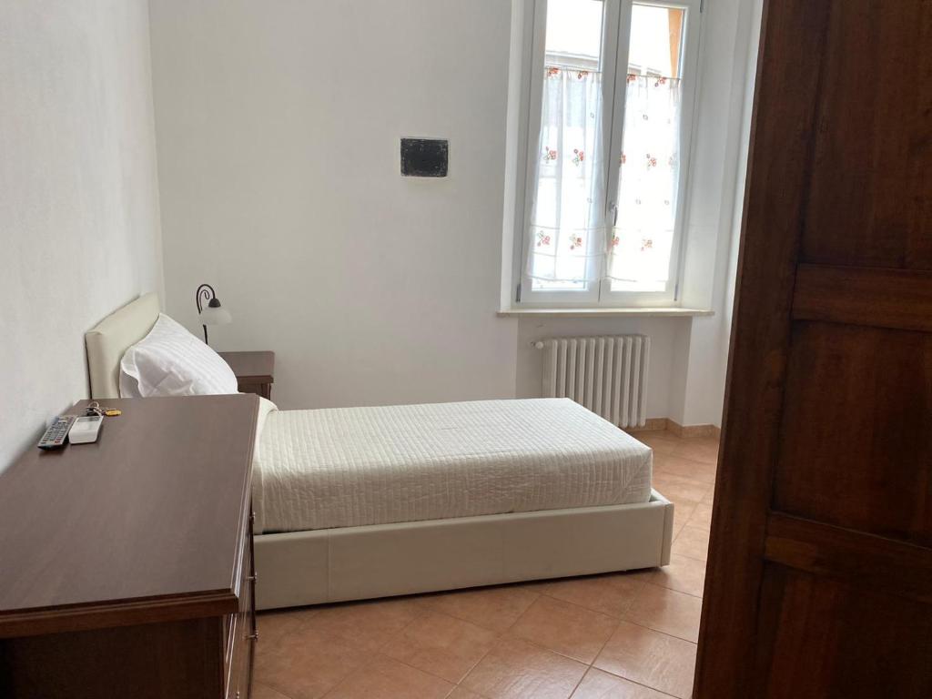 Postel nebo postele na pokoji v ubytování B&B Giulia