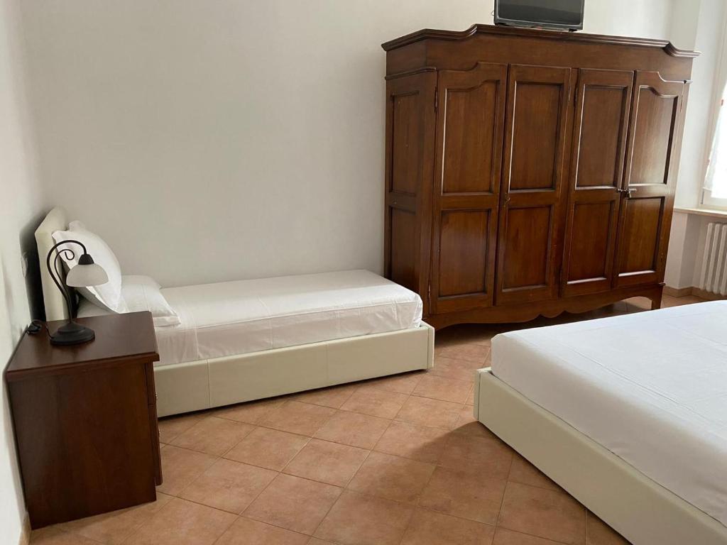 Postel nebo postele na pokoji v ubytování B&B Giulia
