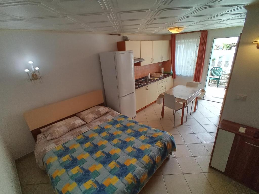 Kuchyň nebo kuchyňský kout v ubytování Apartment Mara