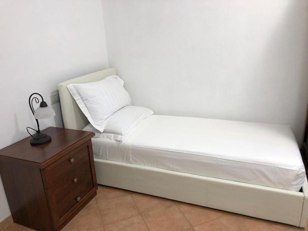 Postel nebo postele na pokoji v ubytování B&B Giulia