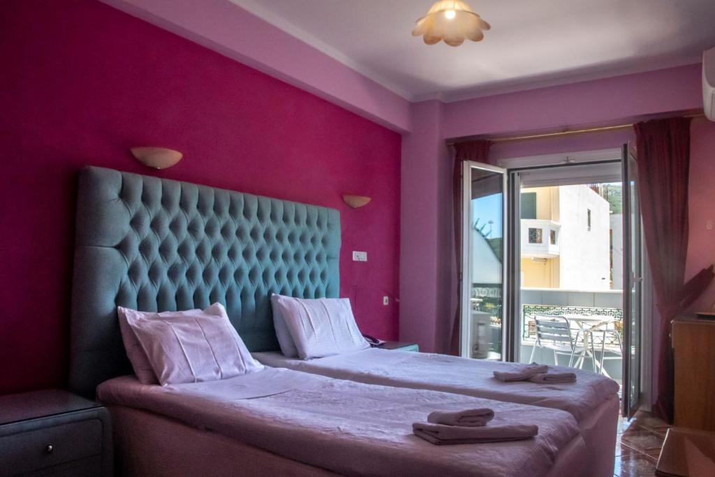 Postel nebo postele na pokoji v ubytování Hotel Astoria
