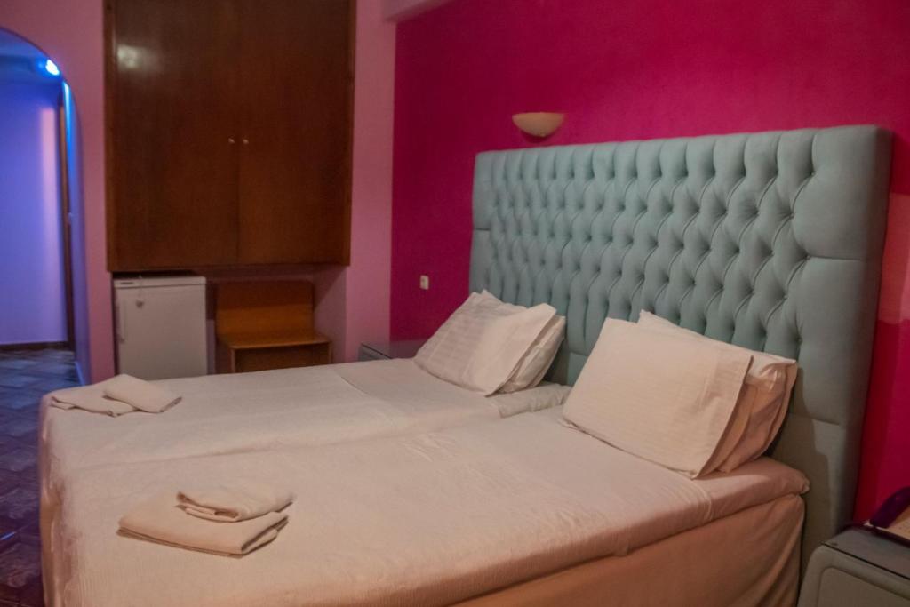Postel nebo postele na pokoji v ubytování Hotel Astoria
