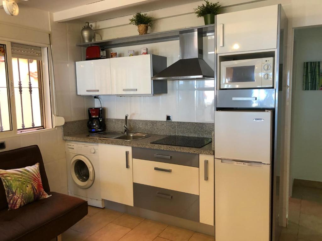 Кухня или мини-кухня в Apartamentos casa Tia Antonia
