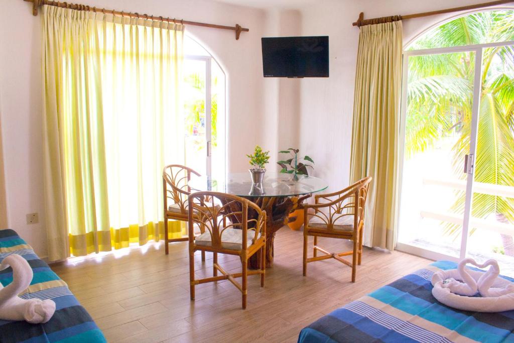 Una cama o camas en una habitación de Hotel Bahia Huatulco