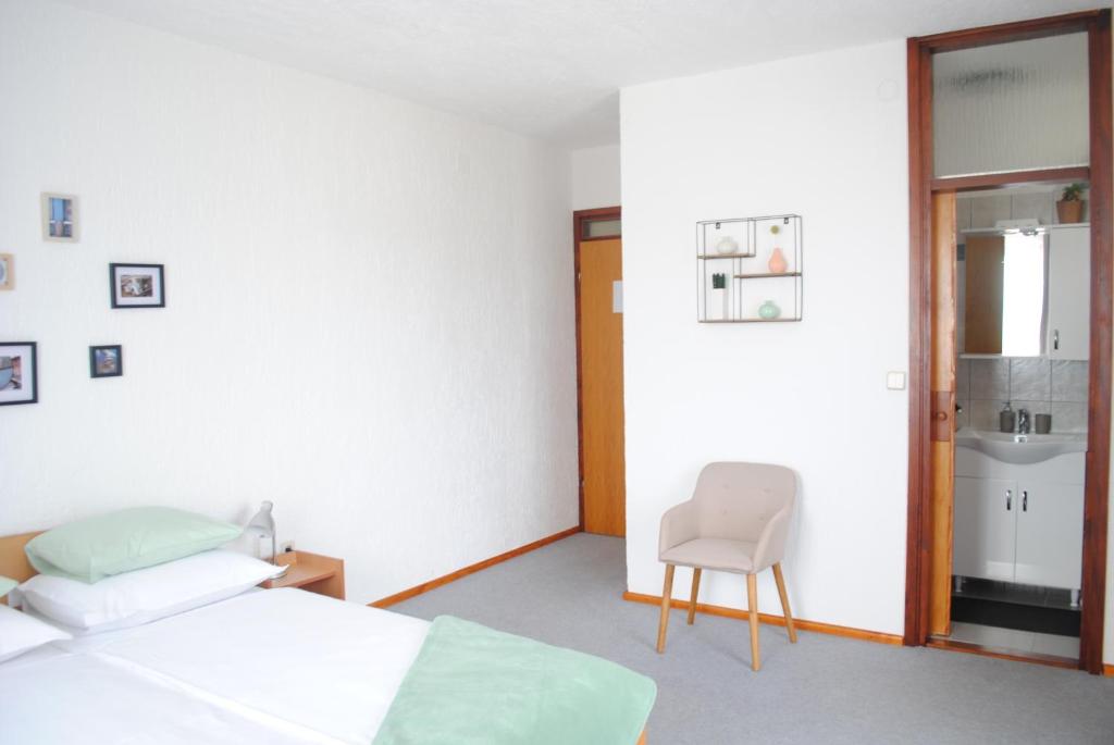 Postel nebo postele na pokoji v ubytování Villa Rustika