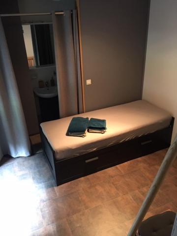 Postel nebo postele na pokoji v ubytování B&B De Notelaar